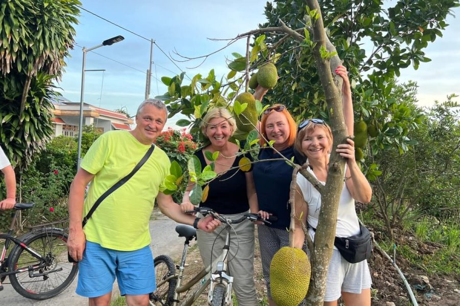 A family visit local garden in south vietnam - vietnam highlight tour 18 days