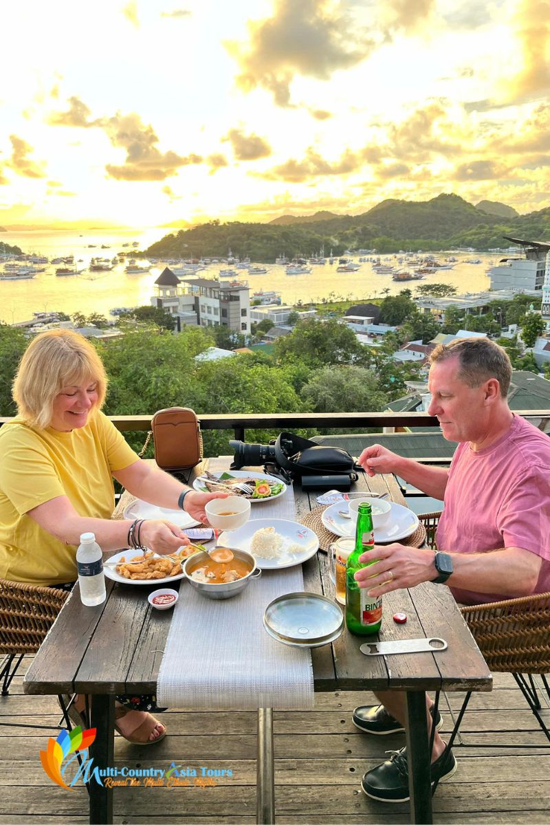 Couple eating dinner in asia tour packages - Multi-country Asia Tours