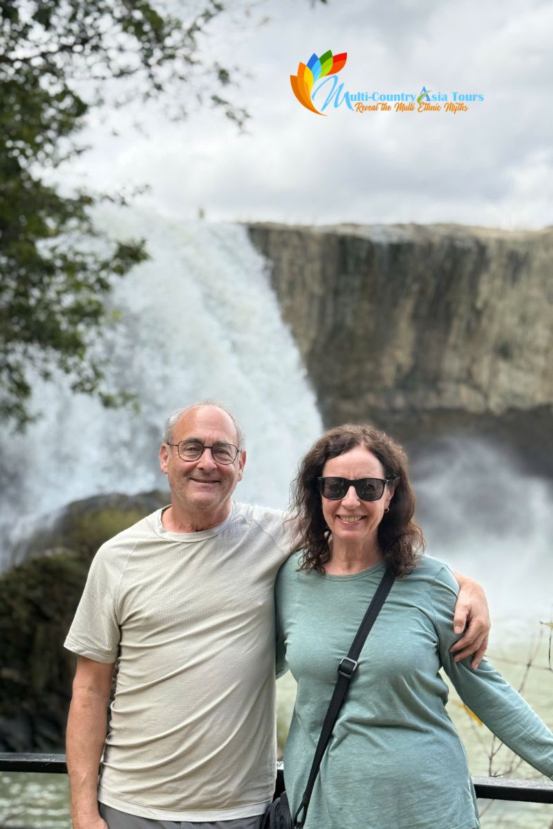 Couple visit Ban Gioc Waterfall in asia tour packages - Multi-Country Asia Tours