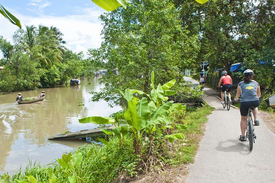 Cycling through Tan Phong -Vietnam Cambodia tour