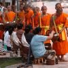 Morning Alms Ceremony - best laos classic tours
