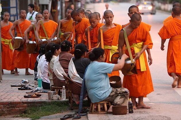 Morning Alms Ceremony - best laos classic tours
