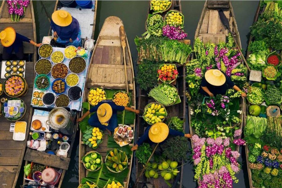 Visit Damnoen Saduak Floating Market in south east asia package tour 19 days