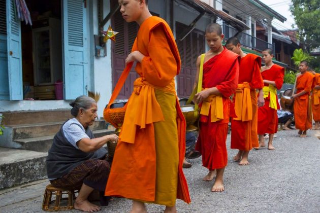 morning alms giving in laos