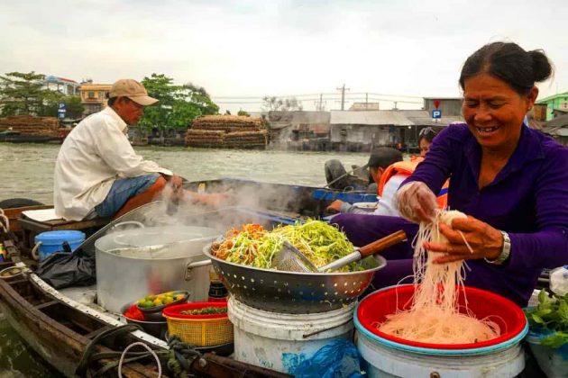 the floating market in mekong delta